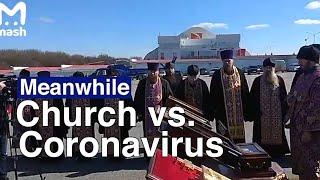 Russian Priests Fight Coronavirus From Above  | The Moscow Times