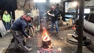 Iron smelting in bloomery furnace in water-powered forge in Gdańsk-Oliwa