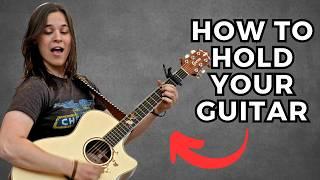 How to Hold Your Guitar Comfortably: Essential Tips for Beginners