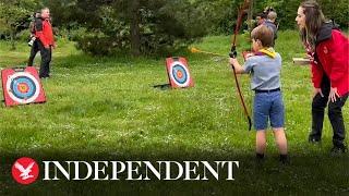 Prince Louis tries archery on his first royal engagement