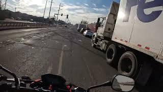 Biker gets cut off by fedex truck