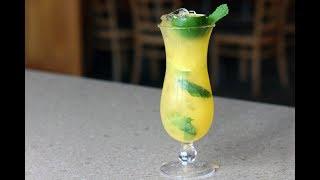 Sandy shakes up a bright Mango Mojito just in time for Summer!