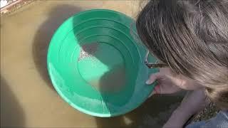 Julie panning for gold at Gold Daughters in Fairbanks Alaska