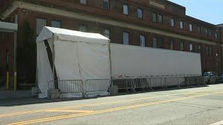 Brooklyn hospital gets refrigerated truck to deal with coronavirus death toll | AFP