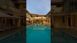 R60 million Steyn City poolside area  #luxuryhomes  #sbearchitects