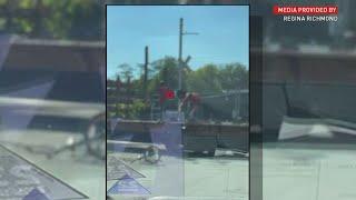 Lockland kids climb over stopped train, as blocked railroad crossings continue to trouble community