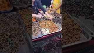 cockroaches, crickets, various other insects and strawberries at Pattaya Beach road
