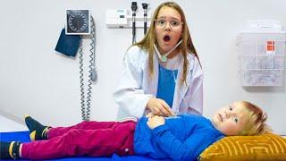 Amelia, Avelina, Akim & Arthur pretend play at the Doctor's office