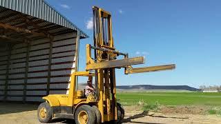 Hyster B70 forklift, V6 engine, w/ Sunny D bale squeeze