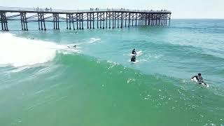 Crystal Pier in Pacific Beach San Diego California uncut Surfing Drone Footage from 4th of July