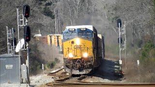 CSX 3030 Leads M221-20 through S curves in (Rebbeca GA) 02/20/23