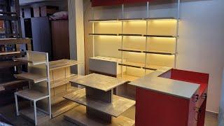 Showroom showcase racks | store self-design | wall showcase shelf design | 625 | sri maari furniture