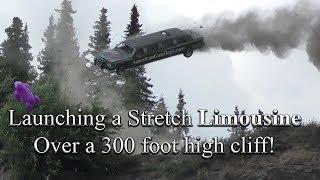 Launching a stretch limo over a 300 foot high cliff! In car video footage!!