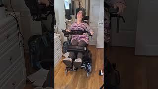 Catherine Gillies tries the wheelchair for the first time.