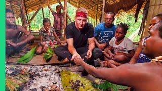 Eating with the Tree People of Papua, Indonesia!! (Raw Clip with the Korowai Tribe)