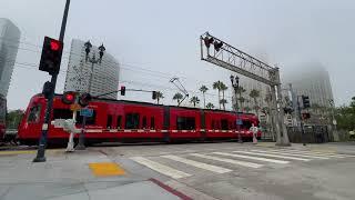 MTS Tram rolls through Front Street Railroad Crossing, San Diego CA 8-6-24