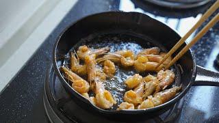 white shrimp fried in olive oil  - long time to prepare, yet simple to cook, only salt and oil