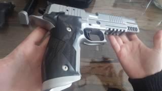 short "unboxing" sig sauer  x-six skeleton (p226) video (vs. walther p22)