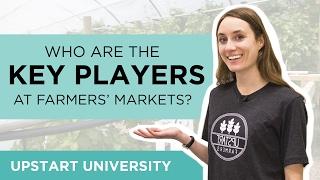 Who are the key players at a farmers' market?