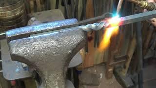 blacksmithing reverse twist