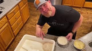 Removing and stretching pizza dough