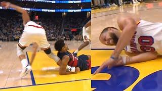 Stephen Curry limps in pain with ankle injury after Jordan Poole landed on him 