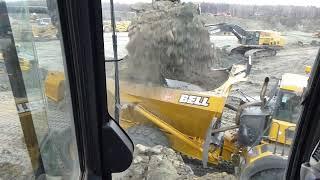 Hitachi ZX650LC and John Deere 450LC tag teaming 40 Ton Trucks