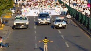 Brave 12-Year-Old Boy Stands Up To 11,000 Anti-Gay Protesters In Harrowing Image