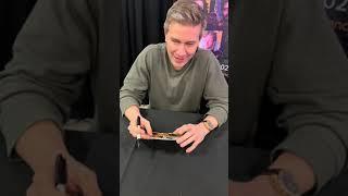 The casts of #thevampirediaries, #theoriginals & #legacies sign throwback photos of themselves!