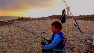 summer beach fishing at littlehampton. watching the sunset with my son 