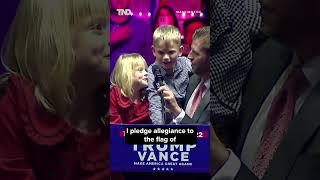 Eric and Lara Trump and their kids walk out to say the Pledge of Allegiance at Trump's final rally