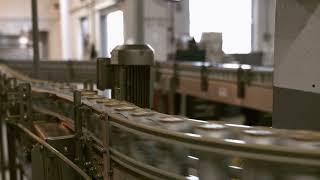 beverage cans on a conveyor belt in bottling facil 2023 02 14 04 47 05 utc