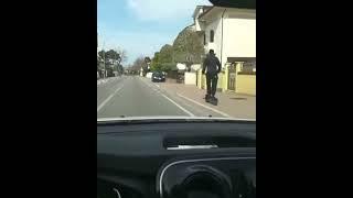 Idiotic Electrical Scooter rider crashes into car