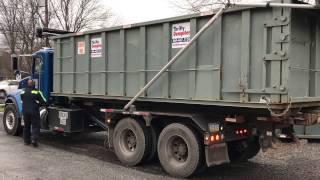 ThriftyDumpster.com Picking up a Dumpster and showing the operation of the Truck