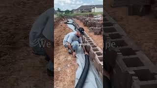 The wall is going up! #landscaping #retainingwall #lawncare #construction