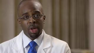 Black men in white coat- PreMed Star