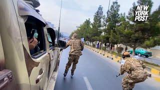 Taliban seen patrolling streets of Kabul on rollerblades with AR-47s