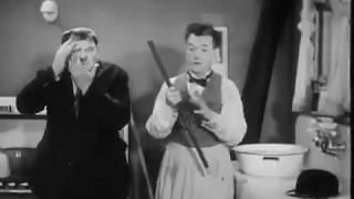 Laurel and Hardy - Ollie bashes his head into a draw - Helpmates (1932)