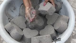 Gritty sand cement heart  crumbling dry and water  Asmr