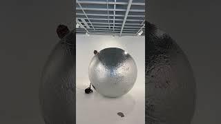 The Viral Silver Sphere: An Inflatable Art Masterpiece  #ViralSensation #ArtInnovation”