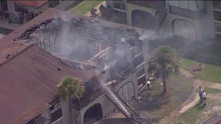 Fire rips through roof of Orange County building