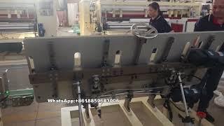 Disposable embossed hand towel paper machine with automatic transfer