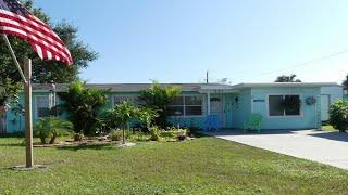 231 Coronada Boulevard, Titusville, FL Presented by Fleckinger Team.