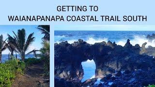 Hiking to a sea arch in Waianapanapa State Park along Waianapanapa Coastal Trail south - Hana, Maui