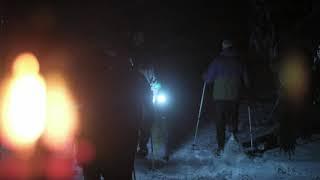 Lantern lit Snowshoe hike at Orchard Beach State Park in Manistee, Michigan