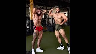 Victor Compan and friend posing in the gym