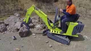 ERLING Micro Earthmoving Equipment Log Grab in operation