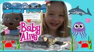 BABY ALIVE has a FUN DAY at the BEACH! SWALLOWED by the OCEAN. The Lilly and Mommy Show! FUNNY KIDS