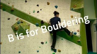 Taking on bouldering problems at The Climbing Center