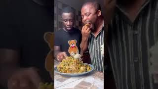 He said "Don't make noise" so that his wife will not find out that he is eating her food in secret 